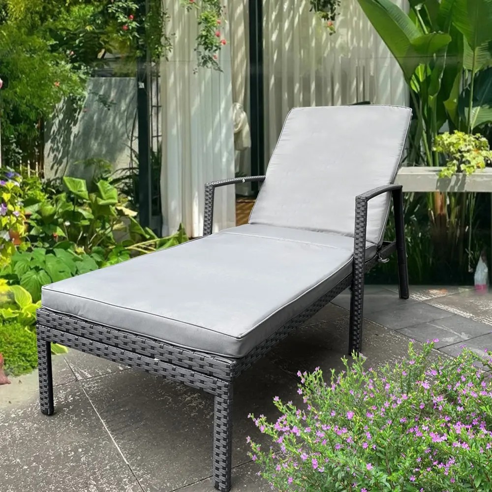 Outdoor lounge chair set featuring a reclining chair with cushioned seat and backrest, perfect for relaxing on patio or garde...