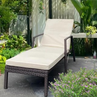 Outdoor lounge chair set featuring a reclining chair with cushioned seat and backrest, perfect for relaxing in a garden setti...